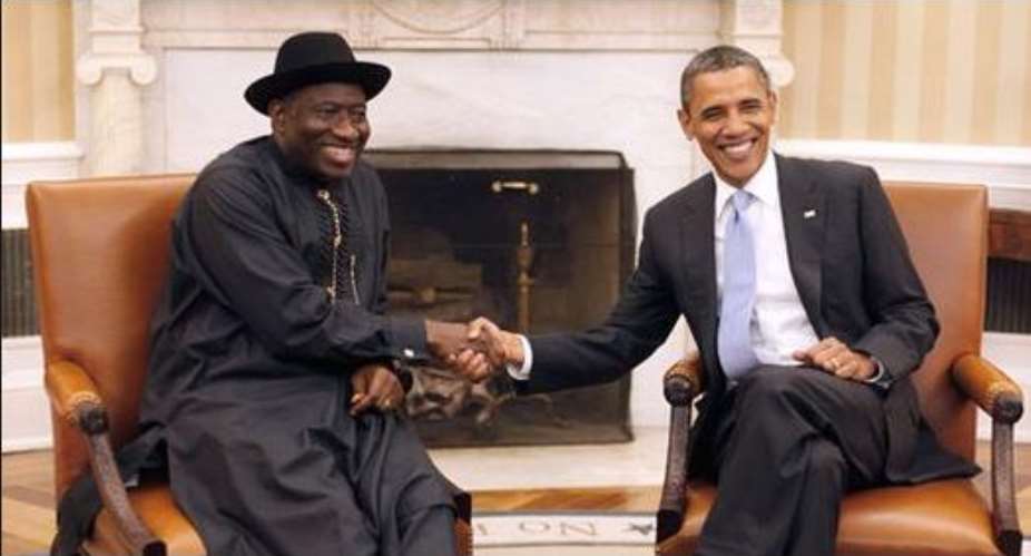 Jonathan and Obama in a handshake