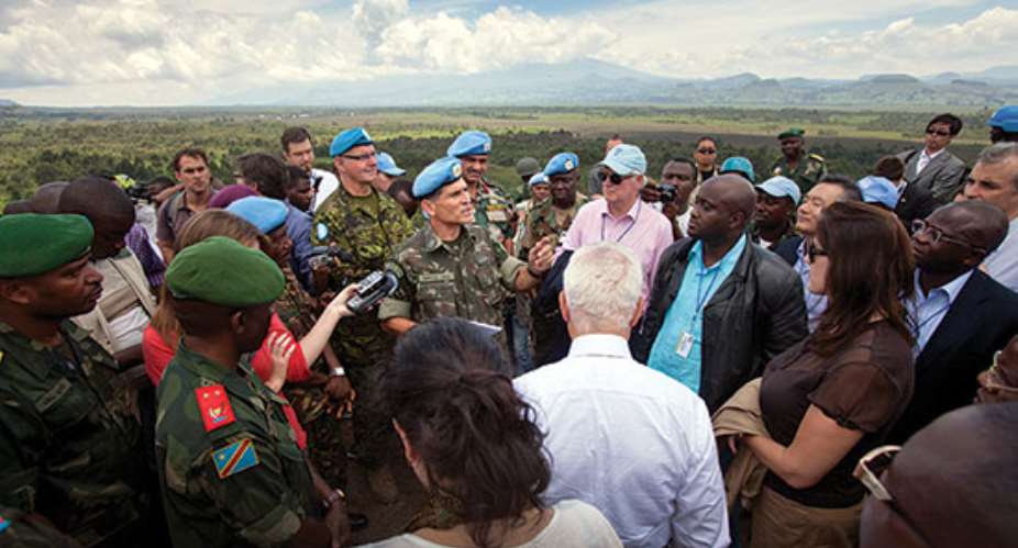 UN PhotoSylvain LiechtiSecurity Council delegation being briefed during its visit Goma, DRC