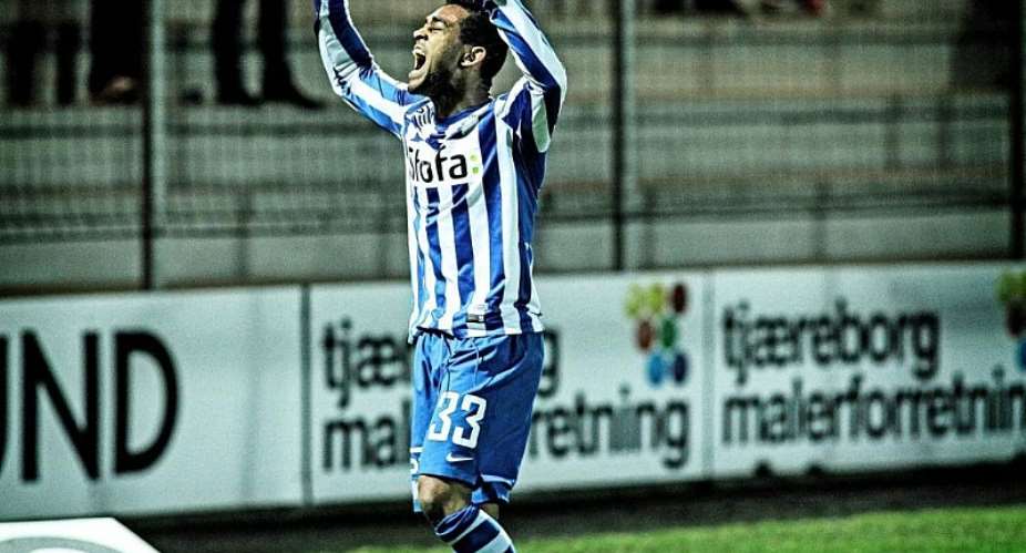 Kevin Mensah celebrates his goal