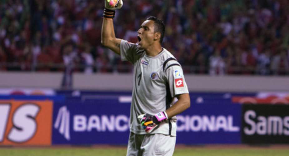 Costa Rica goalie Keylor Navas practices his stopping skills trying to save tennis balls