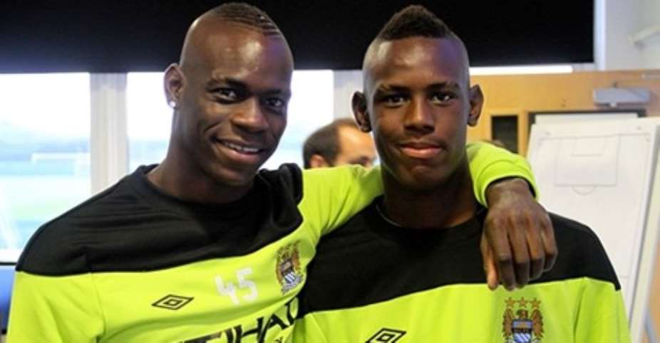 Mario and Enoch. Mario Balotelli has become a cult hero at Manchester City