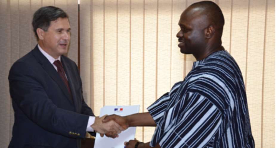 On The 17th Of May, The Ambassador Of France, Frdric Clavier, Presented To The Minister Of Communication, Dr Omane Boamah, A Guideline Report On The Use Of Digital Terrestrial Television (DTT)