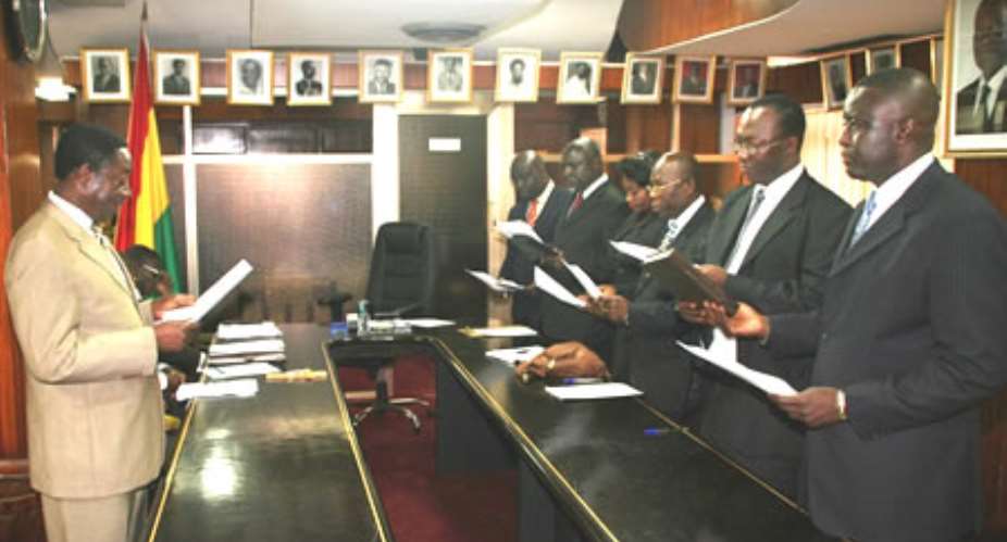 The Minister for Finance & Economic Planning, Dr. Kwabena Duffuor, ianugurating the seven-member board