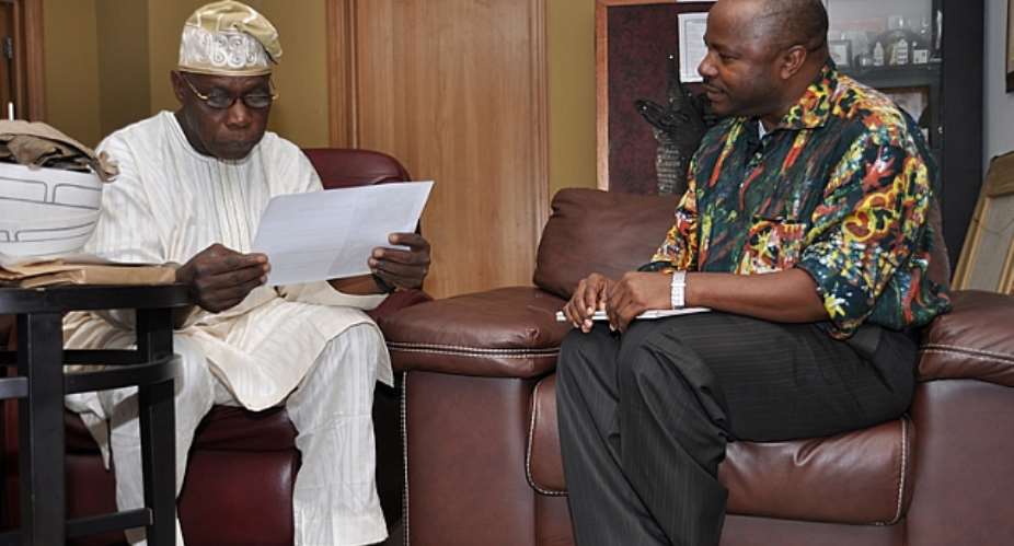 L-R- Former President Olusegun Obasanjo and IITA Director-General, Dr. Nteranya Sanginga, during a courtesy call on the former president in Abeokuta on Monday