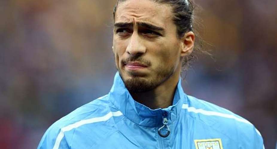 Uruguay's Martin Caceres has inside track on Italy stars ahead of crucial FIFA World Cup clash