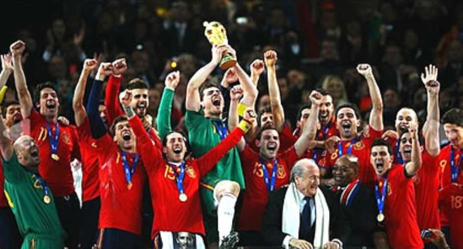The Spanish celebrating after lifting the trophy