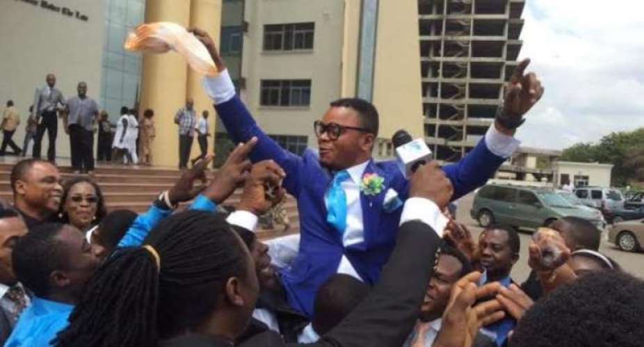 Obinim being held high after the court case