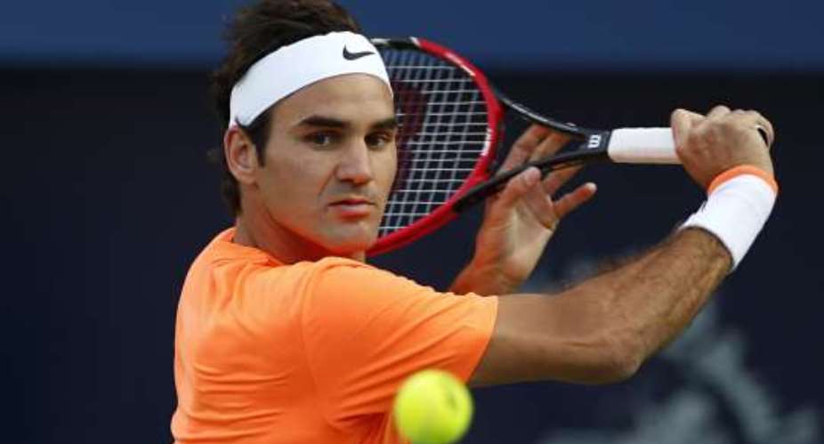 Federer on fire with opening rout in Brisbane