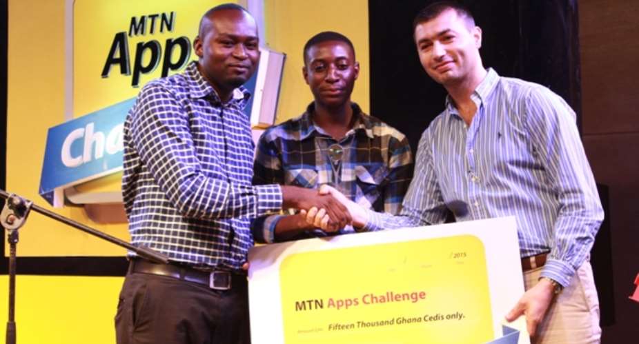 BuzzTrick App Team Nana Ekow Taylor, Elvis Agah And Henk Oppong Receiving The Cash Prize Under Lifestyle Category
