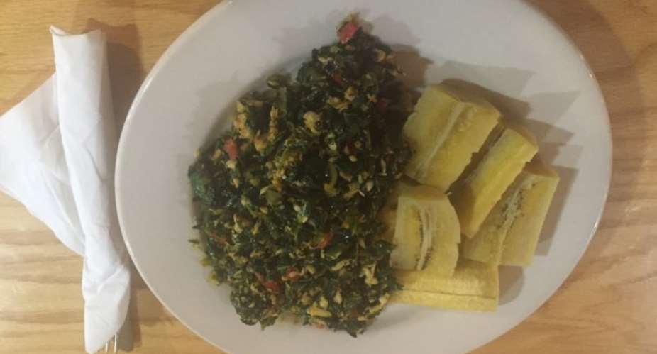 Boiled plantain and green herb stew