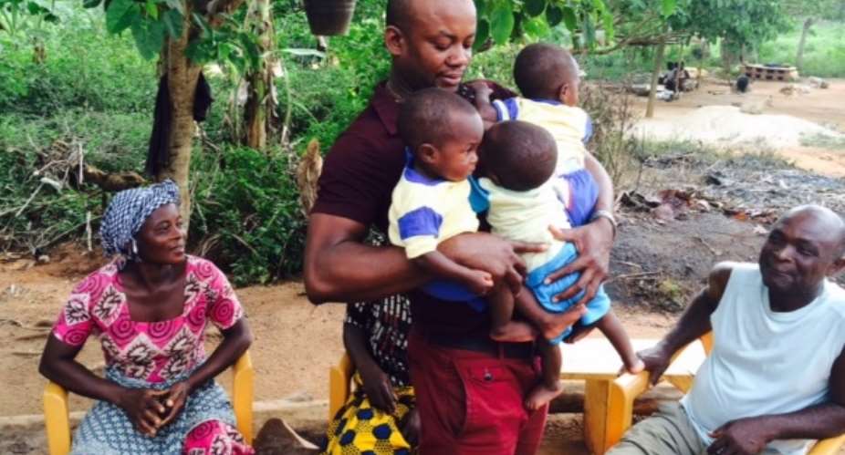 REVEALED :Asamoah Gyan adopts motherless triplets