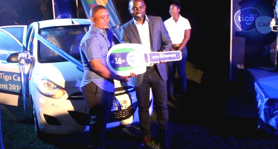 Tigo gives vehicles at mobile financial service agents awards