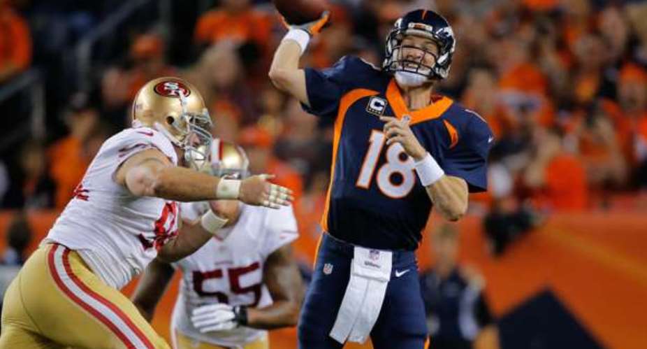 Denver Broncos quarterback Peyton Manning breaks NFL touchdown passes record and the Dallas Cowboys win again