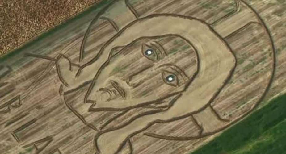 Artist unveils huge picture of Christ in field