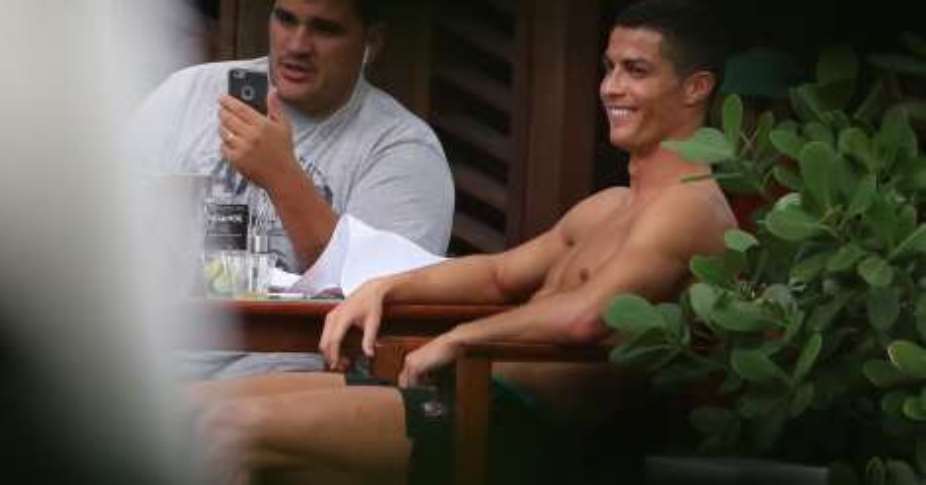 Cristiano Ronaldo: Real Madrid star relaxes poolside in Miami