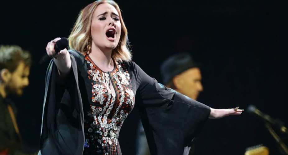 Emotional Adele wows Glastonbury