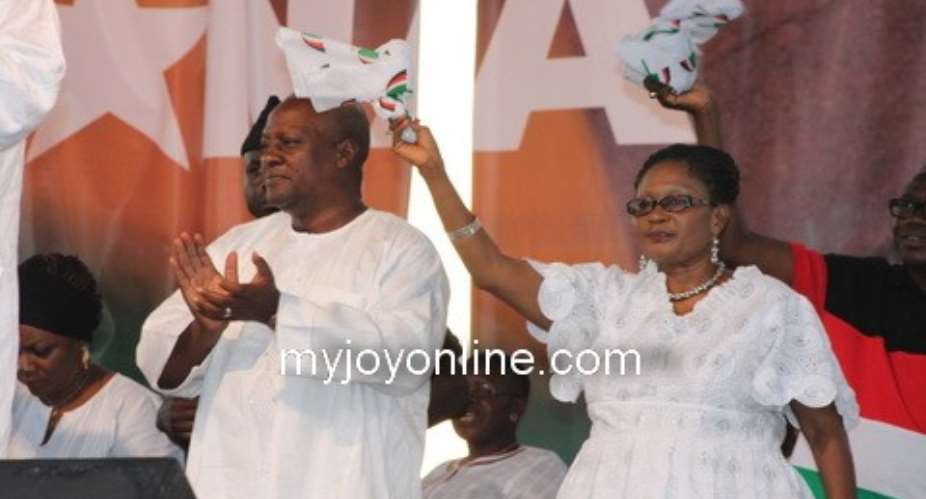 President Mahama and wife responding to cheers from the crowd