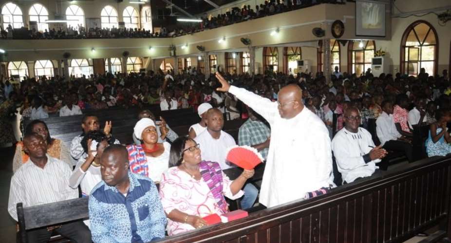 Nana Addo responding to cheers from the congregants
