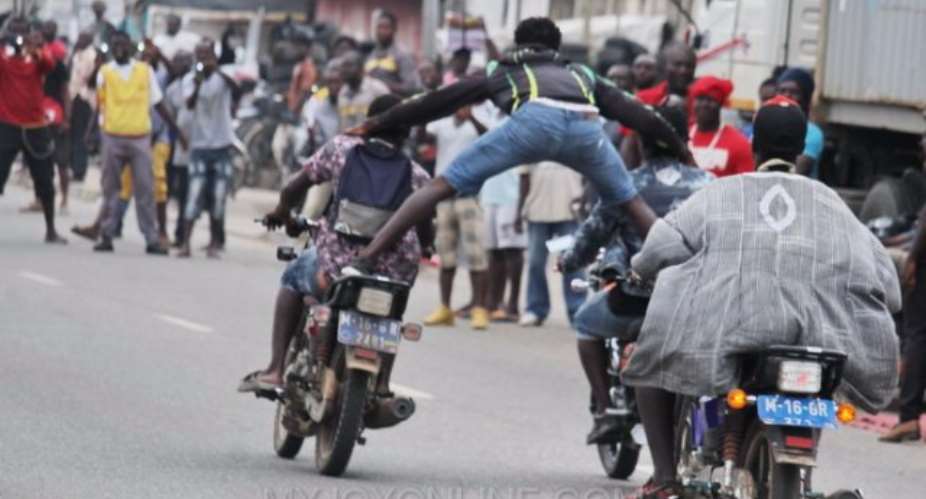 25 photos: an orgy of motor-riding lawlessness at Rastafarian funeral