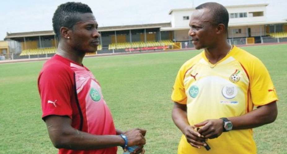 Asamoah Gyan and Coach Kwesi Appiah