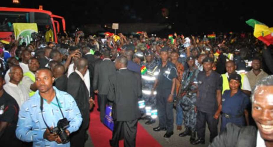 The Police provide a human shield just close to the red carpet laid for the players and officials as the fans push closer