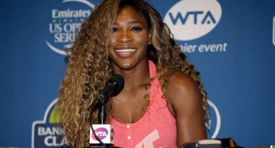 Serena Williams returns a winner in Stanford