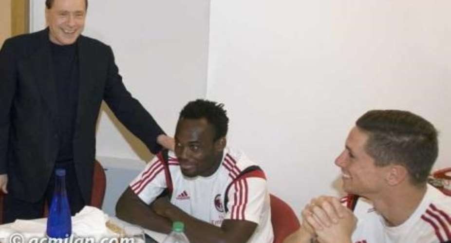 Michael Essien and Fernando Torres spend time with AC Milan owner Silvio Berlusconi