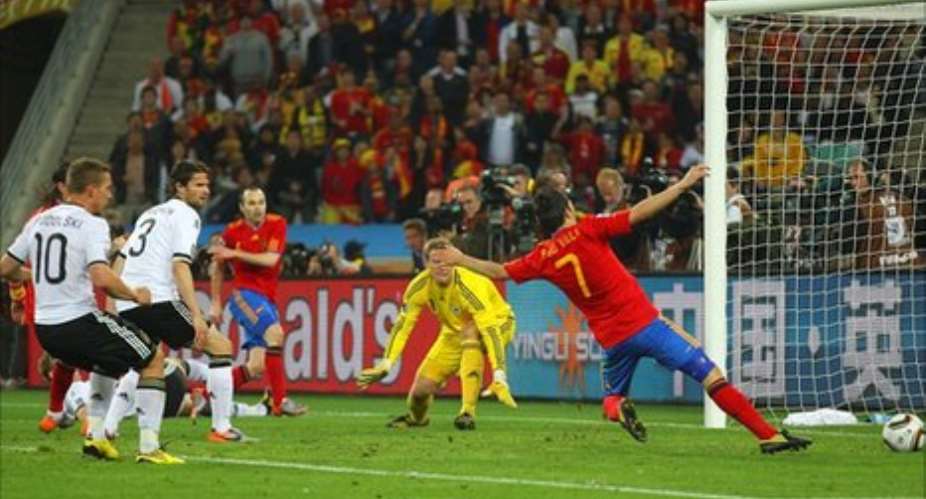 Puyol winner puts Spain in final