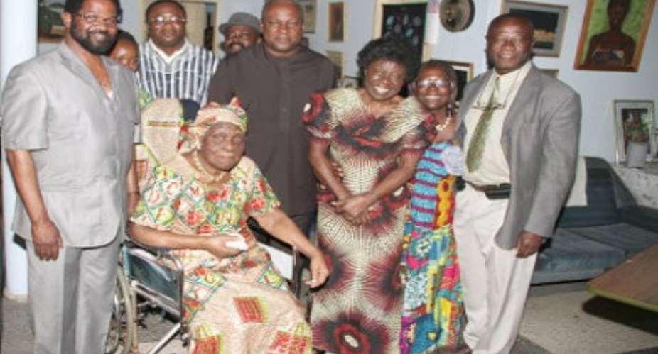 President Mahama in a group photograph with Mrs Theodosia Okoh and some of her family members. Others in the picture include Mr Vanderpujie and Mr Afriyie Ankrah