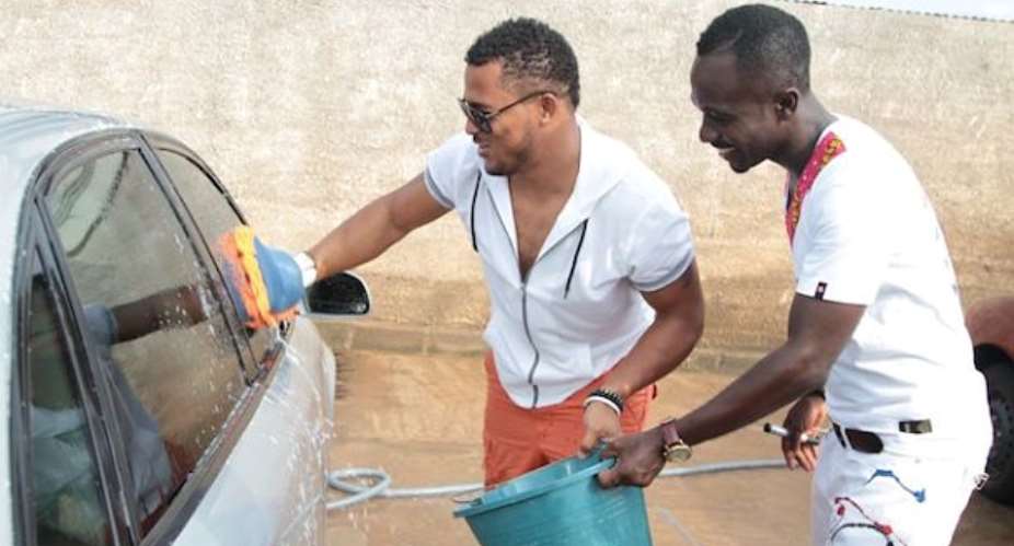 Van Vicker Turns Car Wash Attendant In Ghana