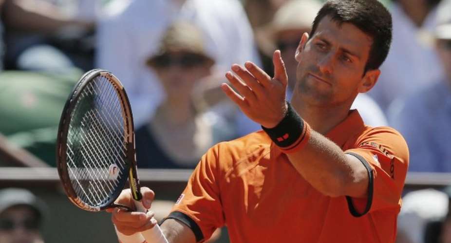 Novak Djokovic wins five-set epic over two days to beat Andy Murray