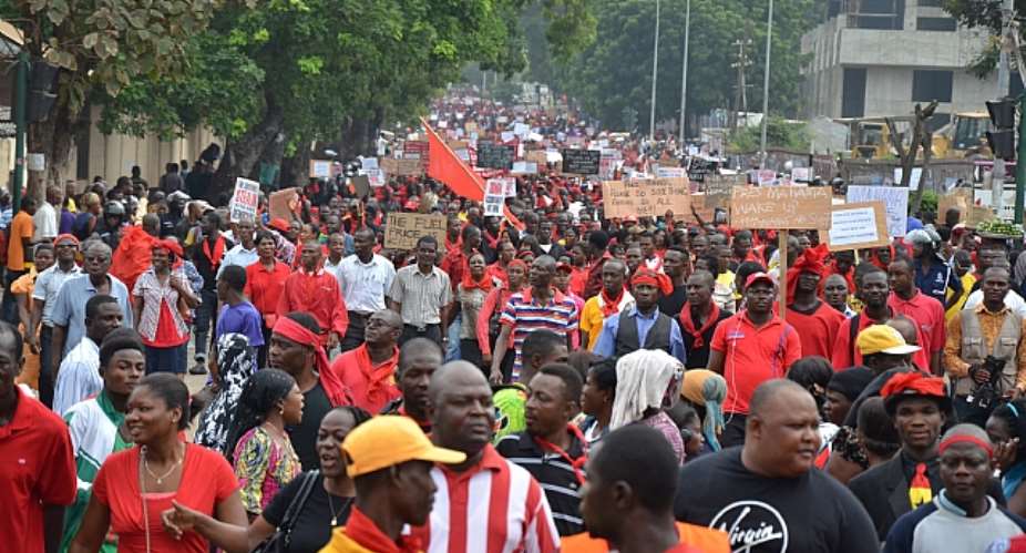 Workers Show Red Card; Bare Teeth At Mahama