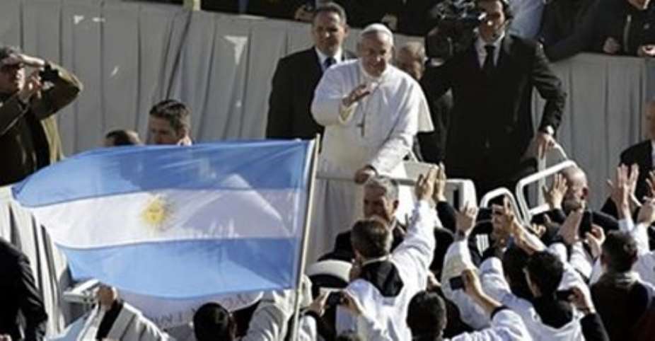 Pope Francis waving at cheering crowd