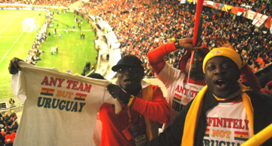Ghanaian fans backing Holland against Uruguay in the semi final clash at the semi final clash at the Green Point Stadium, Cape Town.
