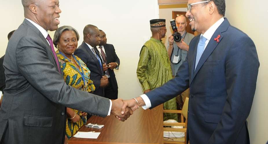 Vice President Amissah-Arthur and Executive Director of UN AIDS, Michel Sidibe, exchanging pleasantries.
