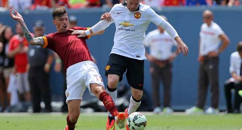 Hair dryer out: Manchester United manager Louis van Gaal display against Roma