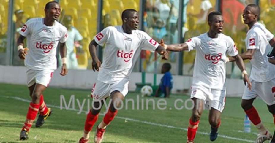 Kotoko players celebrating a goal.