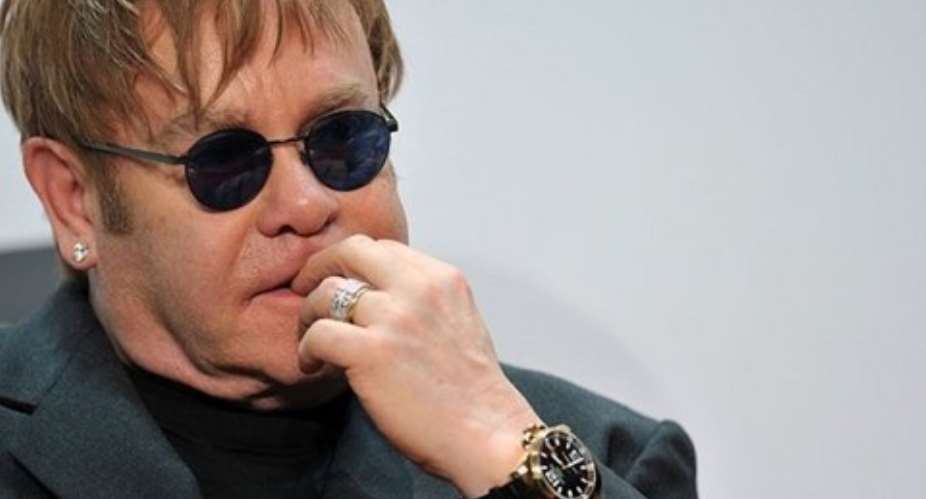 Sir Elton John says he is concerned about the effect of the articles on his charity work