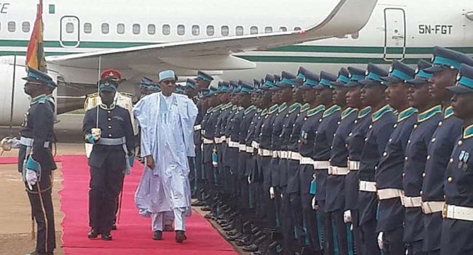 Brooms greet President Buhari arrival in Ghana
