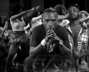  Patapaa, Eddie Khae and Level Up Dancers in a pose