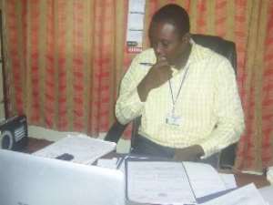 Figure 2 Anthony Sumah in his usual workaholic mode