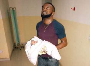 Actor, Kevin Uvo Welcomes Baby Boy with Wife