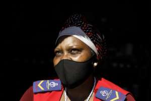 66-year-old sangoma Gogo Molahlegi believes that practices like bone reading must be done in person. By Guillem Sartorio (AFP)