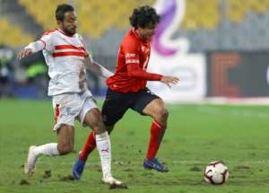 Namibian Riaan Hanamub (L) and Moroccan Nordin Amrabat contest possession in an African Cup of Nations Group D match. By JAVIER SORIANO (AFP)