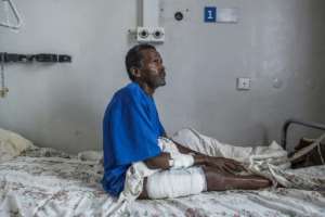 Tamrat Kidanu said he lay motionless after being shot as he heard Eritrean troops massacring his son and other men in Dengolat. By EDUARDO SOTERAS (AFP)