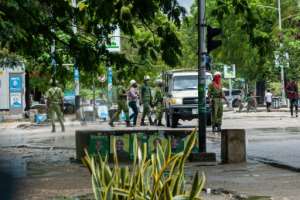 Tanzanian Security Forces arrest two people in Stone Town, Zanzibar. By Patrick Meinhardt (AFP)