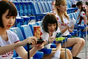 Taiwan's Rakuten Monkeys cheerleaders have been interacting with fans online. By Sam Yeh (AFP)