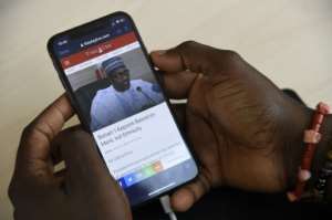 Tens of millions of young Nigerians connect to news and other sources through social media. By PIUS UTOMI EKPEI (AFP)