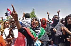 Tens of thousands of people have massed non-stop outside the army headquarters since April 6. By AHMED MUSTAFA (AFP)