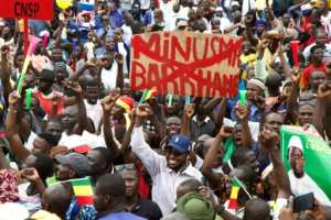 Thousands gathered in Bamako's central square on Friday to celebrate Keita's ouster. By ANNIE RISEMBERG (AFP)